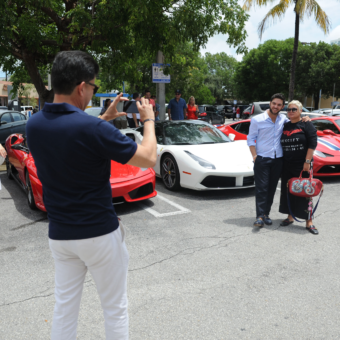 Guests taking pictures outside the Ferrari Drive and Dine event