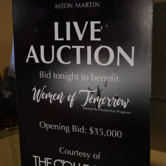 sign at the Women of Tomorrow Gala 2019